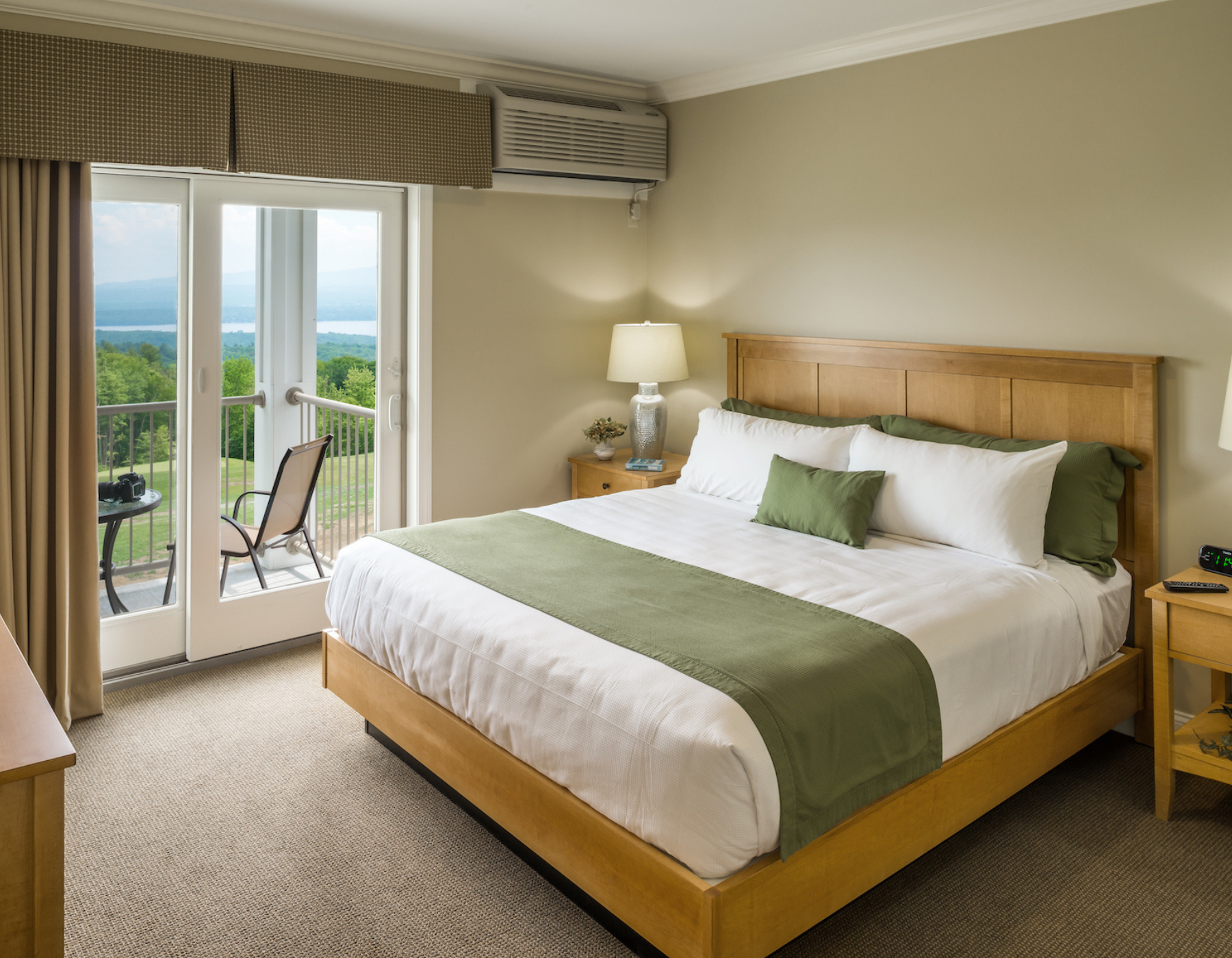 Guest room with a lake view at Steele Hill Resort
